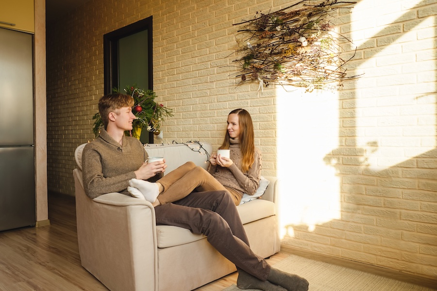 couple relaxing together with coffee at home 2026 03 17 00 04 27 utc